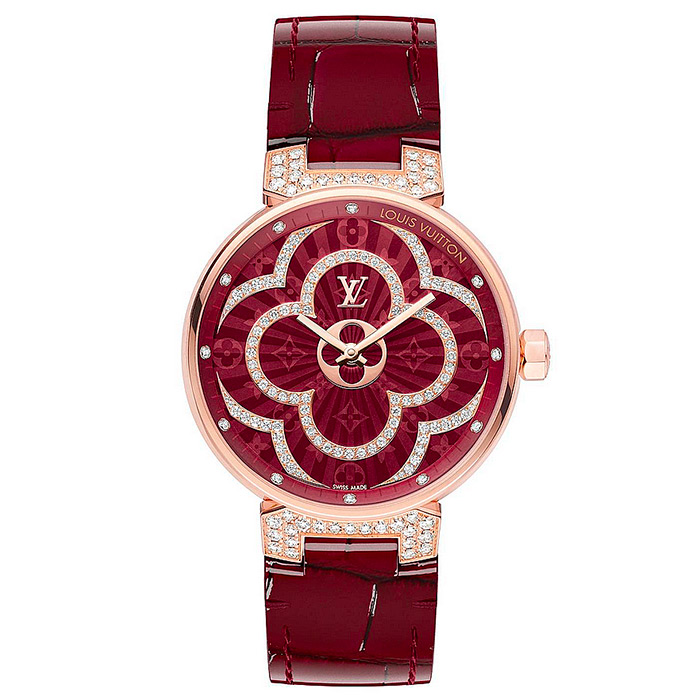 TAMBOUR MOON DIVINE 35 $30,195.00 White mother-of-pearl dial with Monogram flowers enhanced by 108 diamonds