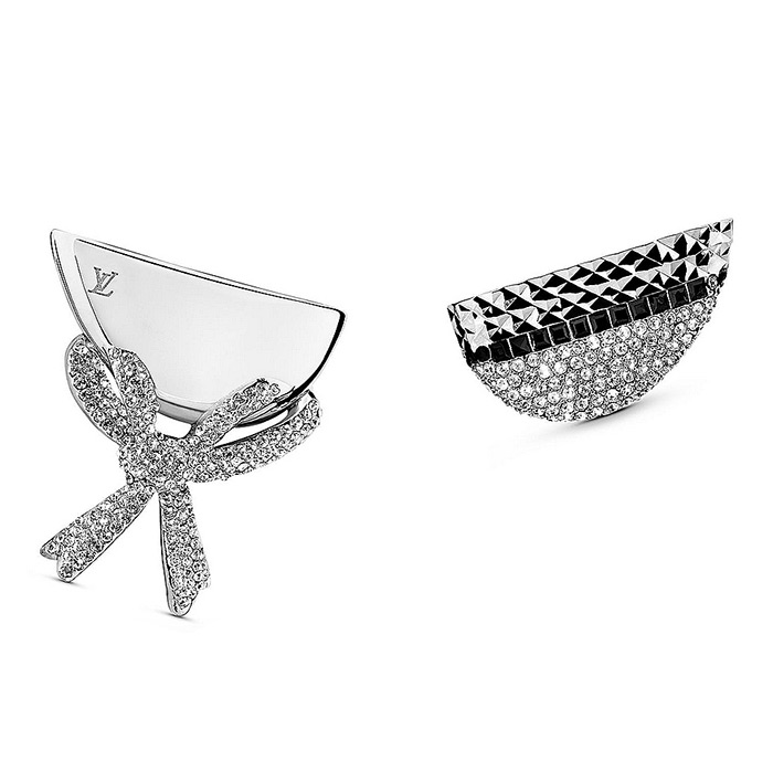 Bionic Earrings Node  $585.00 One is encrusted with sparkling micro-paved crystal strass and the other features a delicate bow and engraved LV Initials
