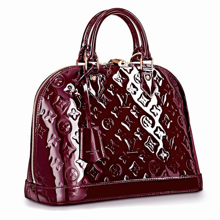 Alma PM in Amarante $2,390.00 12.8 x 9.5 x 6 inches, looking elegant in shiny Monogram Vernis leather