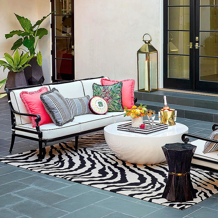 Tiger Stripe Indoor/Outdoor Rug, Carlisle Seating in Onyx Finish, Mila Low Side Table in Black