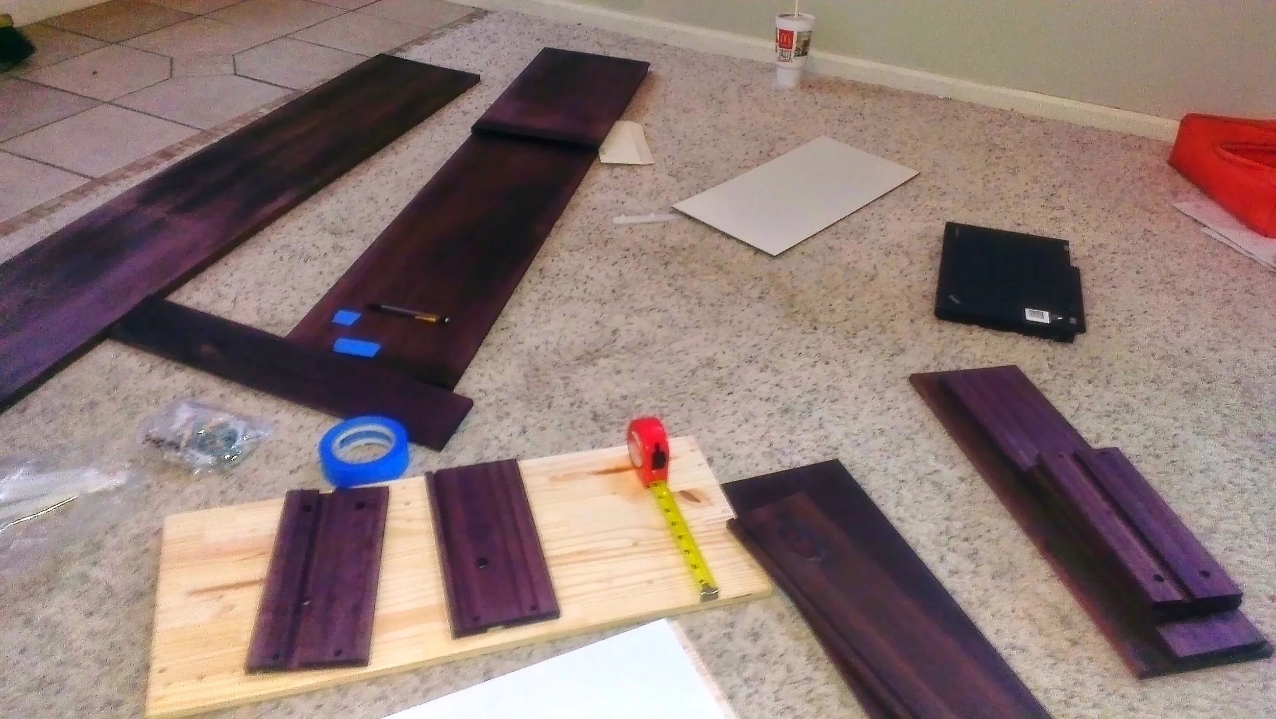 Drilling holes on the freshly cleaned carpet might not have been a win. Oh well.