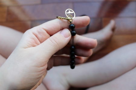 Mine here is from Mala and Me made from black onyx. " Black Onyx assists with challenges in life, especially those caused by a drain of energy. This stone can help you to feel comfortable within yourself and in your surroundings. Black Onyx is said to promote self-control helping the wearer to keep excessive emotions and passions under control, while keeping you protected."