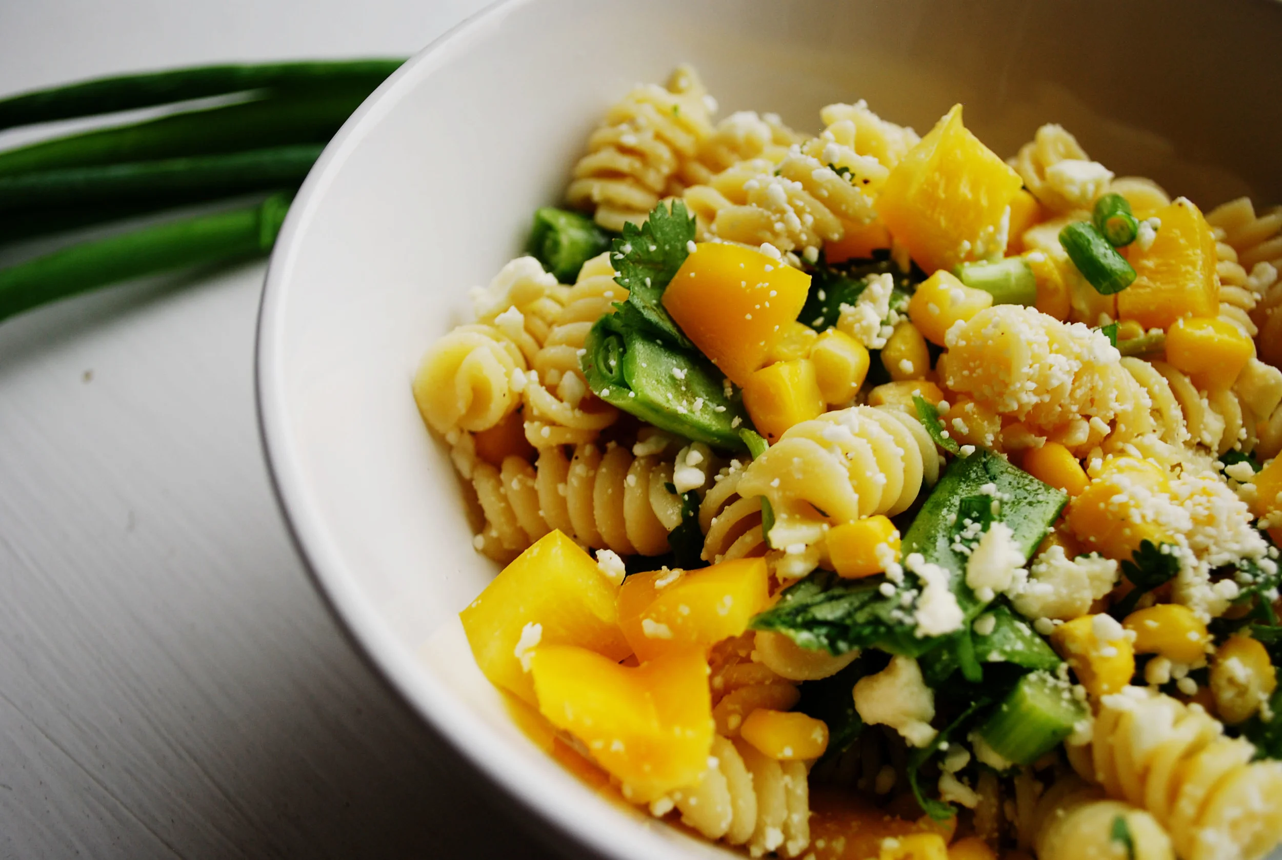   CILANTRO CORN FUSILLI       AUTHOR: DESIGN&amp;DIGEST  RECIPE TYPE: SIDE  SERVES: 6-8&nbsp;     PREP TIME: 15 MINS  COOK TIME: 7-10 MINS  TOTAL TIME: 25 MINS     INGREDIENTS:  - 1 LB FUSILI PASTA  - 3 SCALLIONS  - 1 CUP SNAP PEAS, TRIMMED AND HALVE