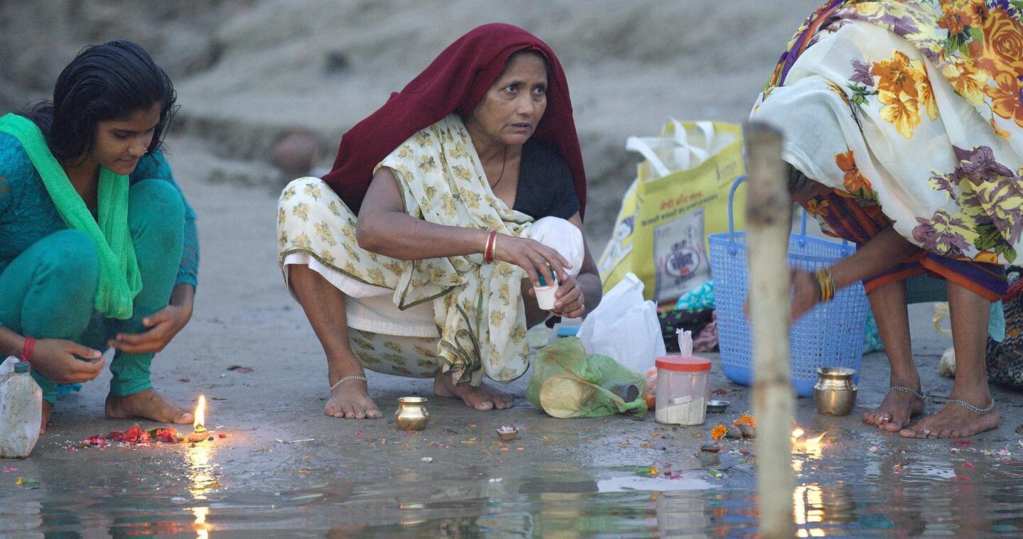 5am prayers, Ganges River Varanasi India. 
The air was so still you could hear the subtle lapping of the waves on the tiny little boat I had positioned only myself and my camera on. As people started to come down to the river to greet the morning sun