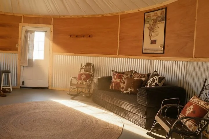lounge area with couch and rocking chairs at Dual Silos