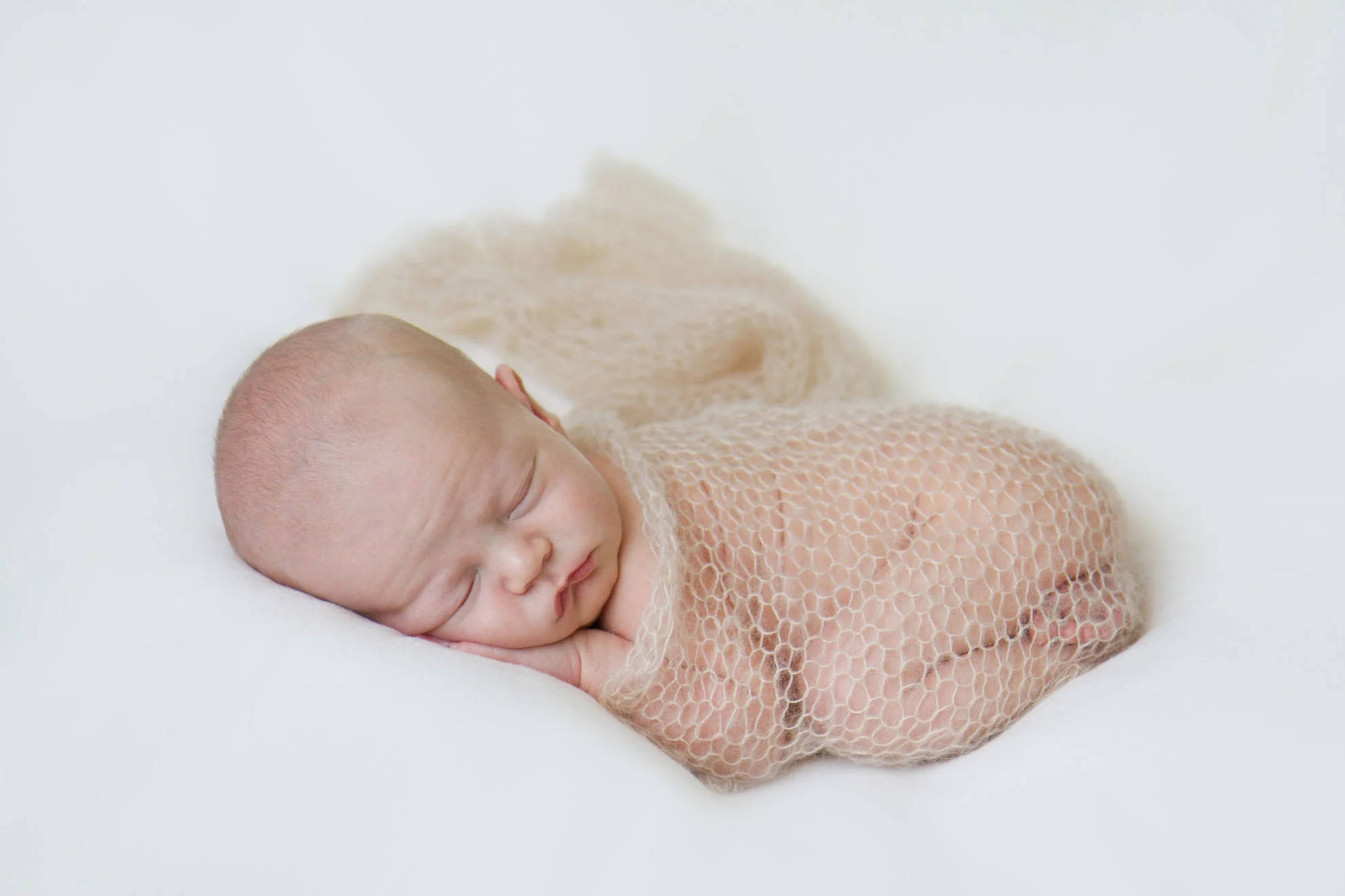 Baby-tucked-up-with-mohair-wrap.jpg