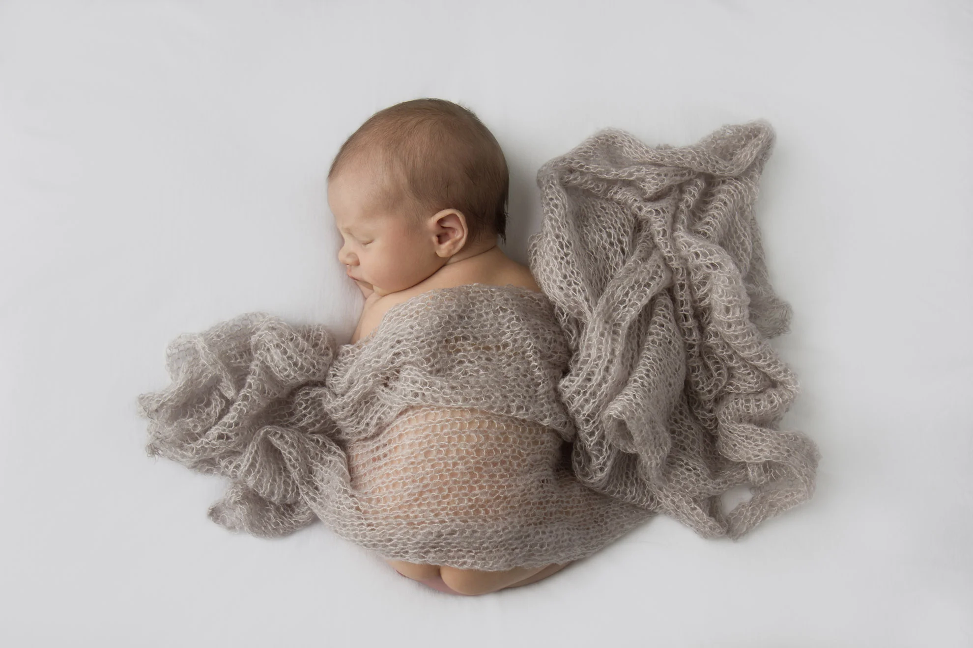 Hamilton-photographer-baby-with-beige-mohair-wrap.jpg