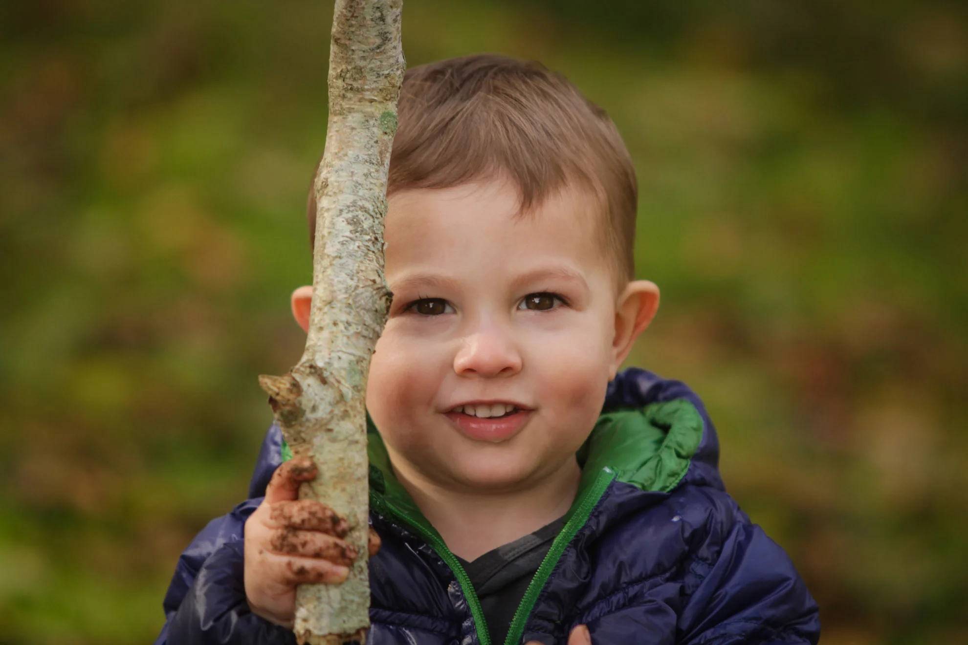 Hamilton-photographer-toddler-playing-with-stick.jpg