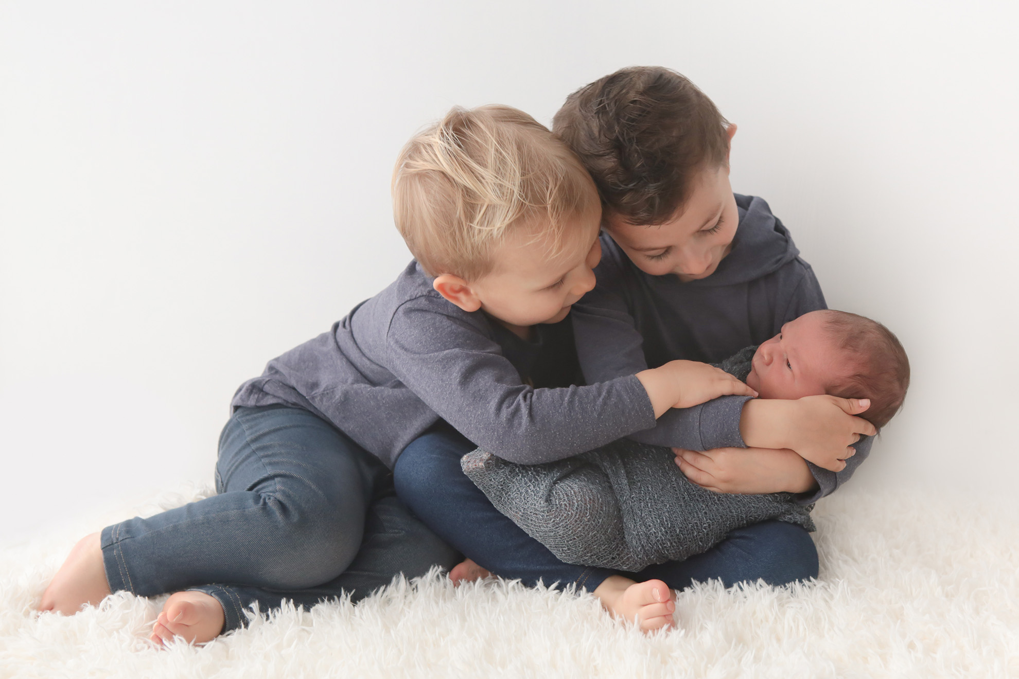 Newborn-baby-and-siblings-photography.jpg