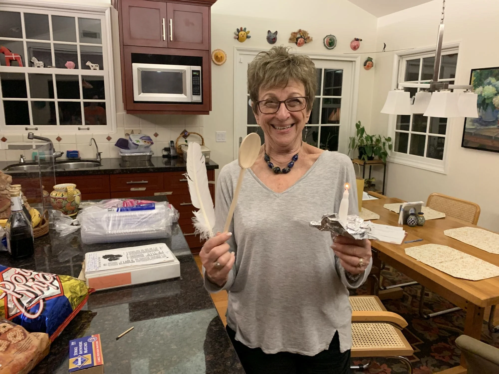 Sally getting ready for the search for hametz, remaining bread.