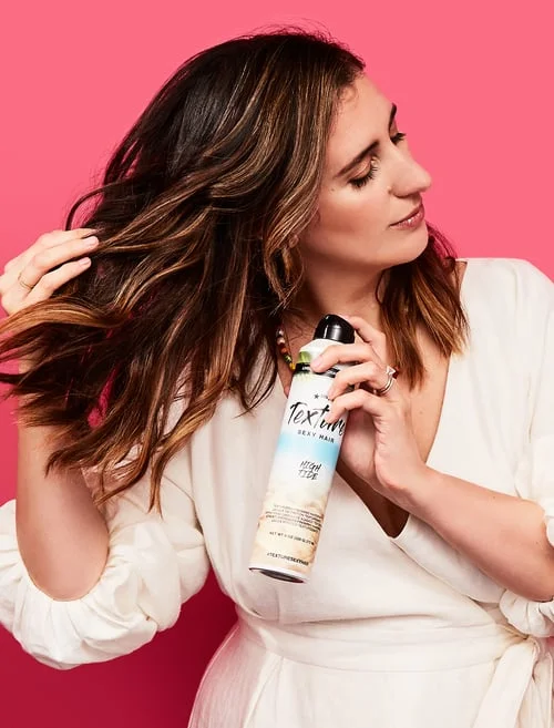 92125bb95d000c2f80b2e9.85388834_Amanda_With_Product.jpeg