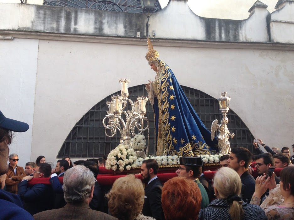 A Procession we stumbled upon in the center of Sevilla. These are religious events held all throughout the year where people carry a beautiful float embellished with candles, incense, and flowers to honor and celebrate the particular Virgin. The street temporarily shuts down and people gather to admire the structure. These are very popular during Semana Santa and most of the city is covered with giant processions like this!