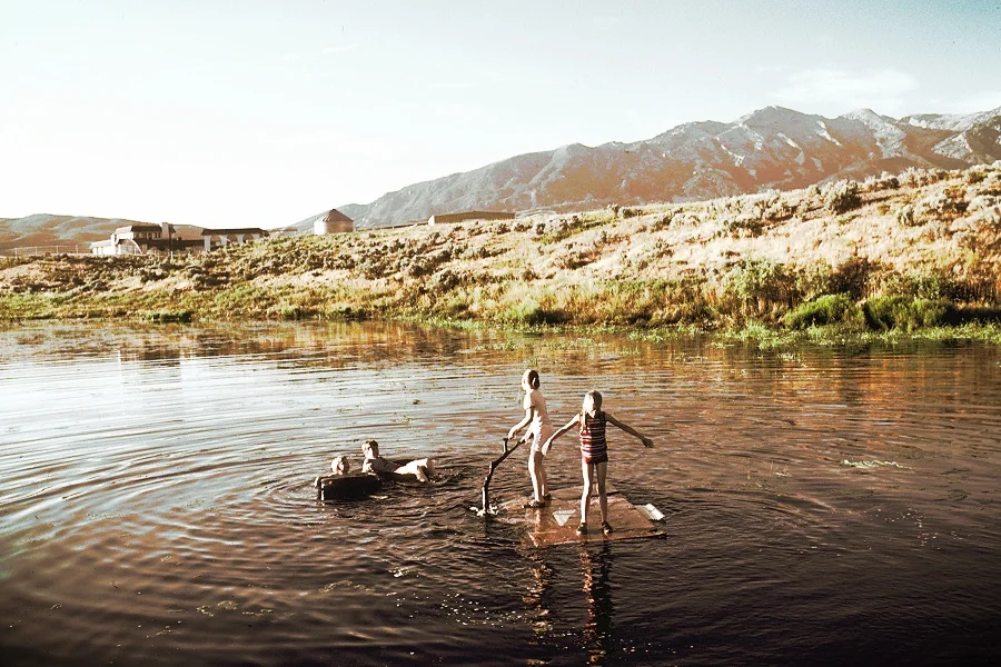 ( Children Playing in a Lake | Linda Bartlett)