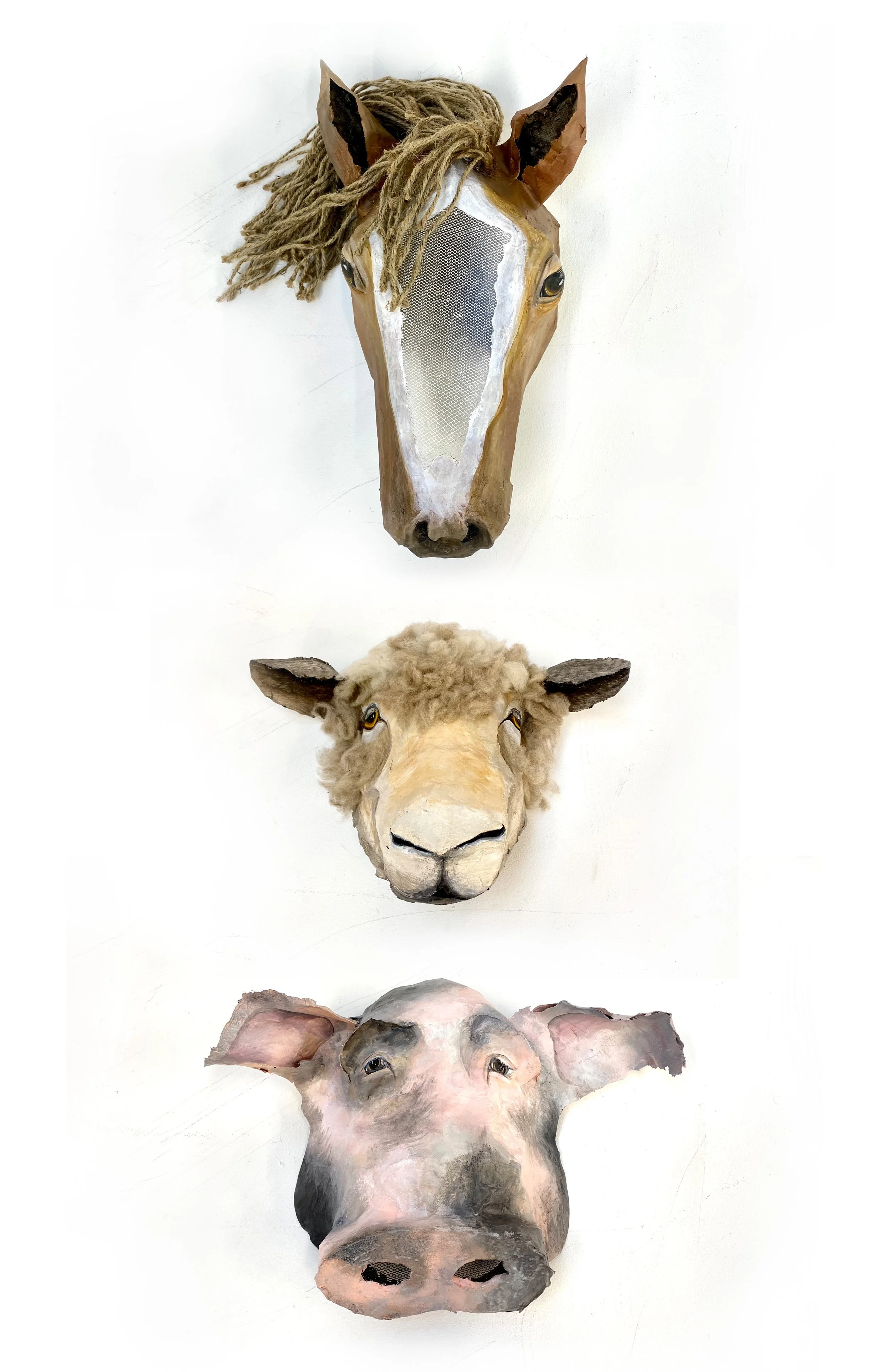 mask triptych  paper mache, cardboard, acrylic, wire  In Response to Orwell's  Animal Farm , Ellis Gallery 