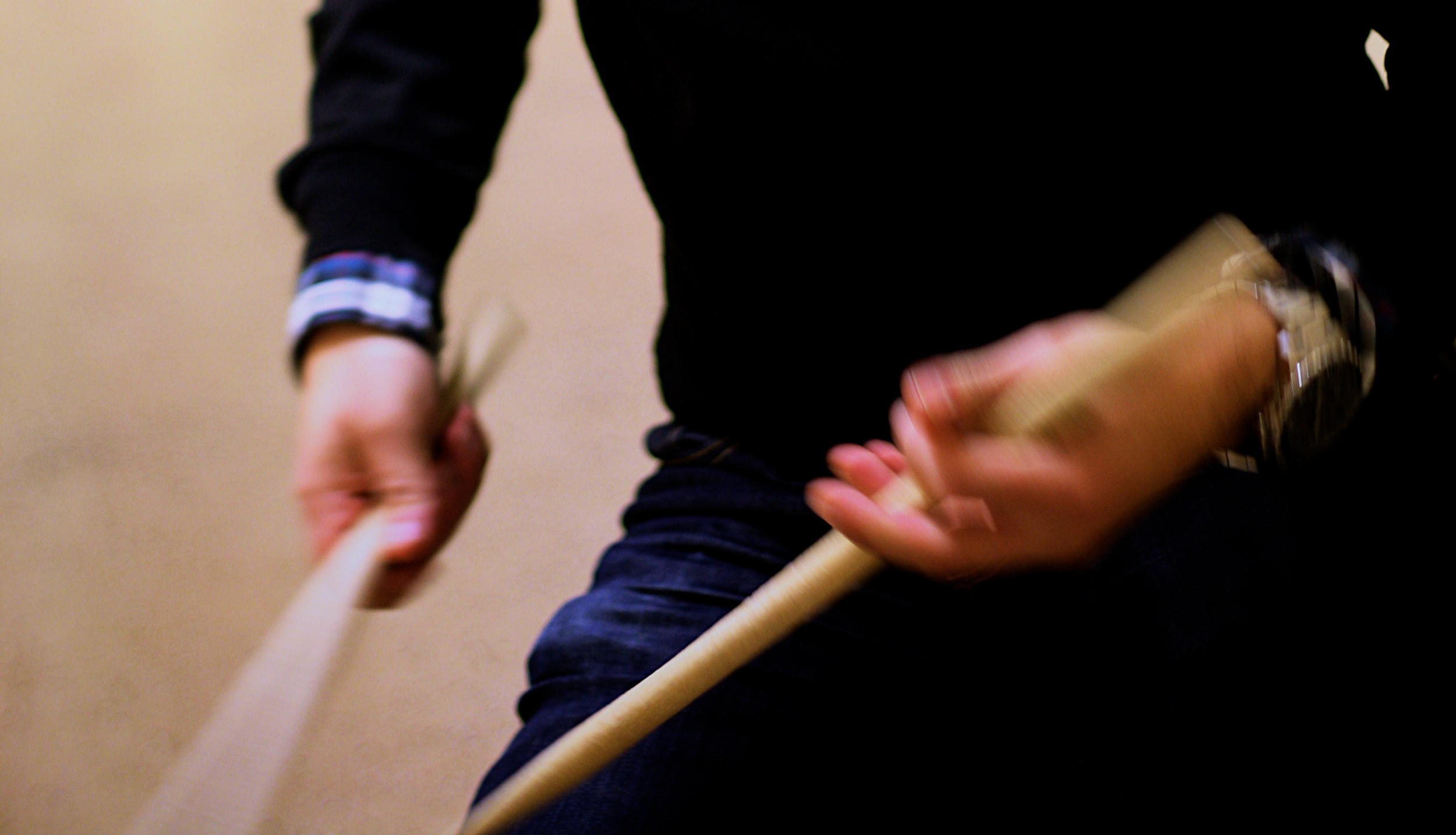 Joe_hands_sticks.png