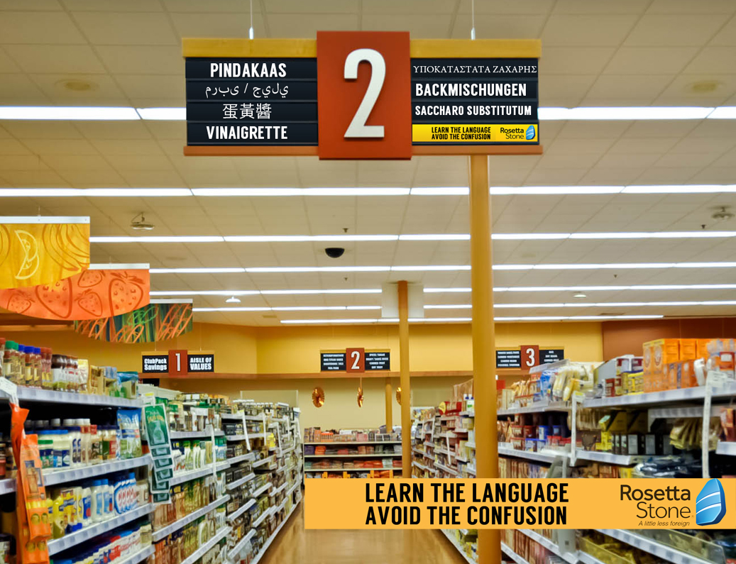 In-store would be at grocery stores, replacing one side of the sign with foreign words for the items in the aisle. 