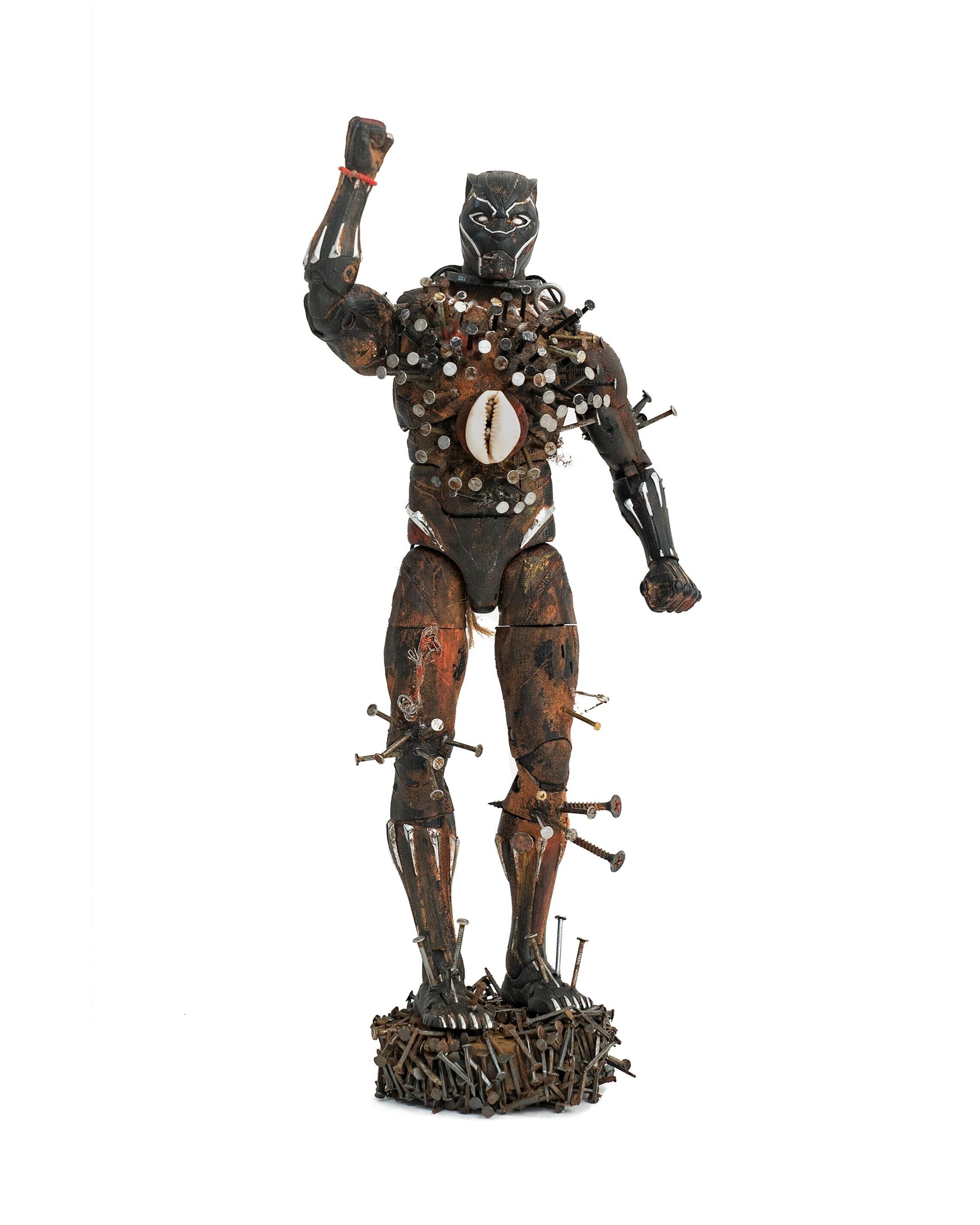  Power figure for the American Negro, 2020                                                                 Earth, nails, leather, cowry shell, beads, hair, plant fiber, magnet                                                                           
