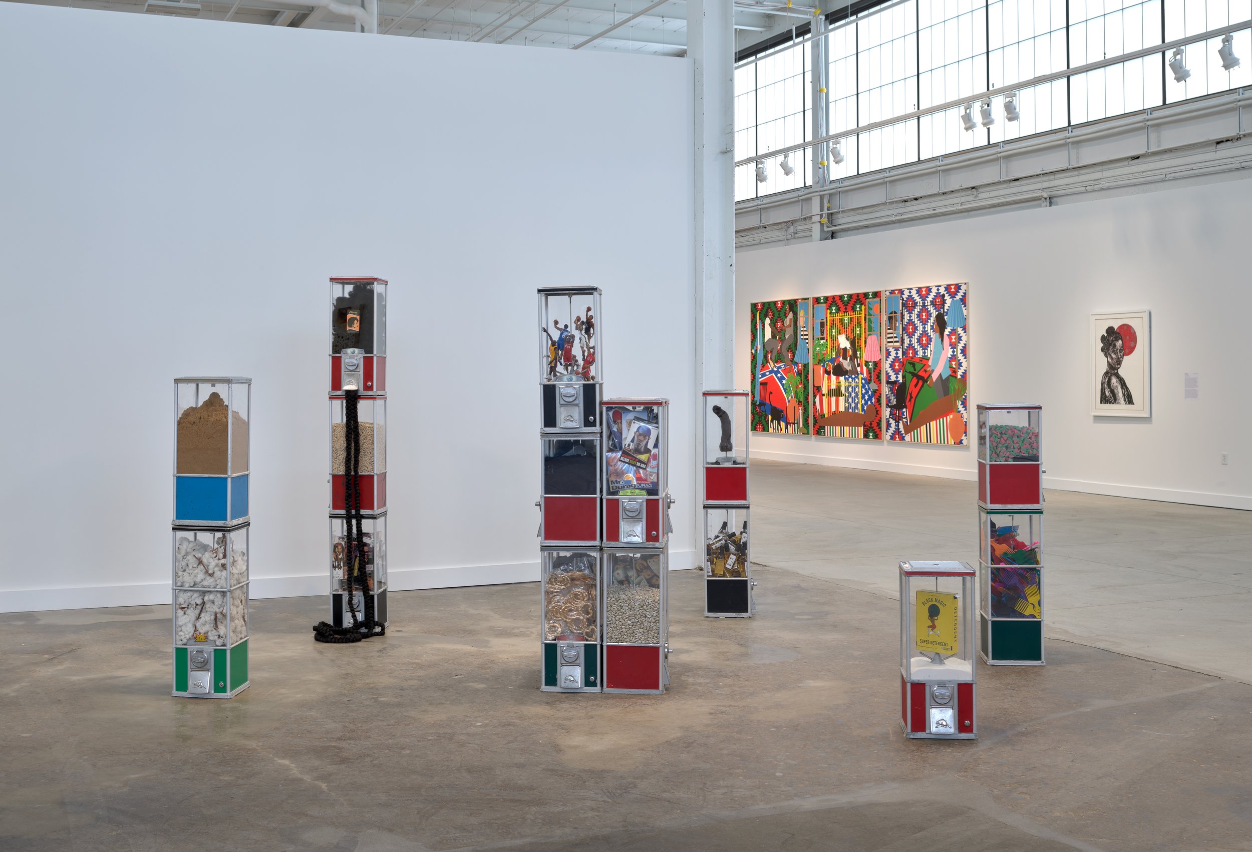 Hot Commodity, 2022 Antique vending machines, cotton, soil, afro picks, watermelon candy, brown sugar, durags, black phallus, rum, black-eyed peas, indigo, synthetic hair, cassettes, detergent, basketball figurines, cowries, Air Force 1 sneakers, b