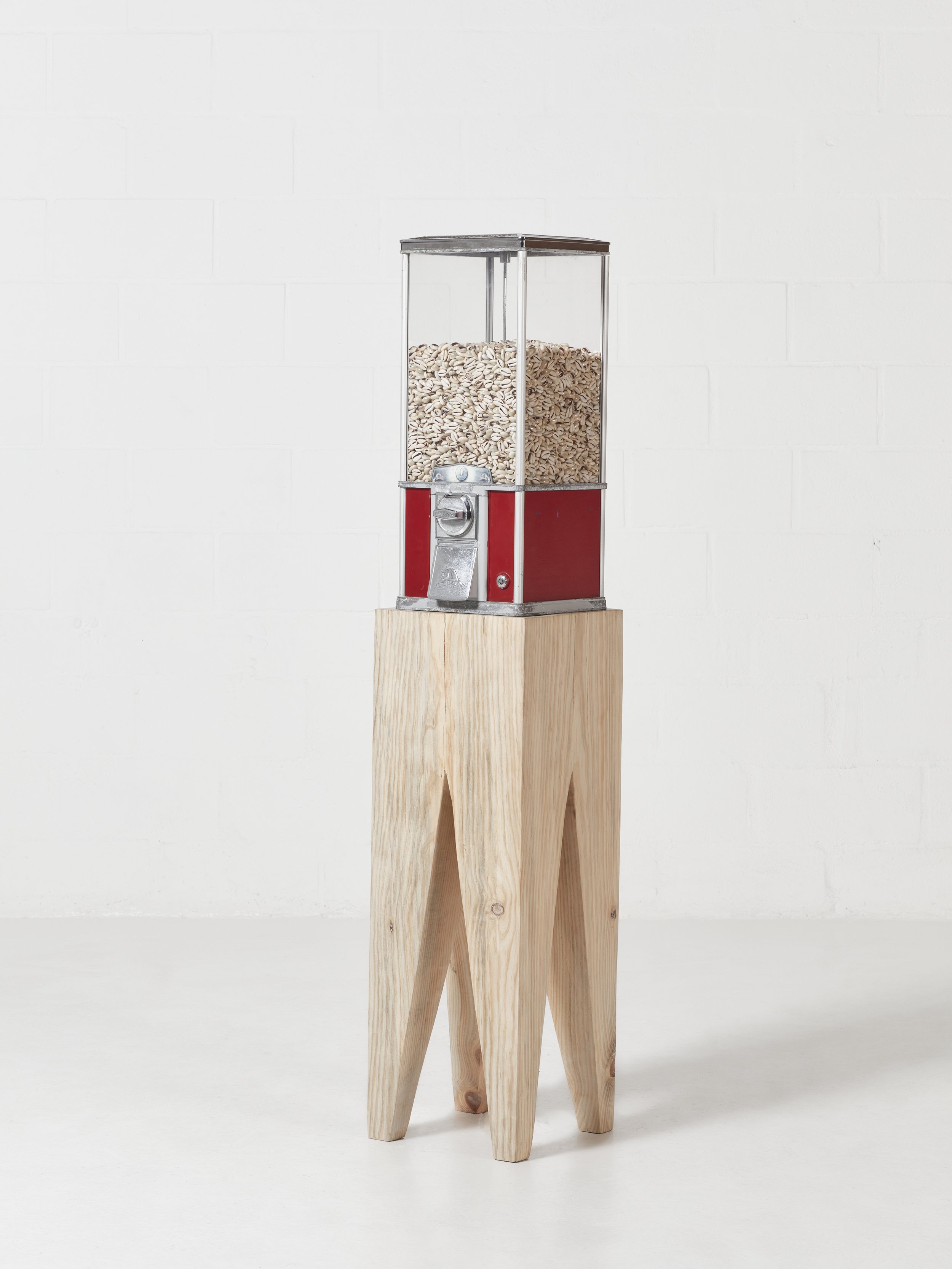 Goodluck Totem 60 (Red), 2023 Vending machine, cowrie shells, timber 62.5 × 12.6 × 12.6 inches