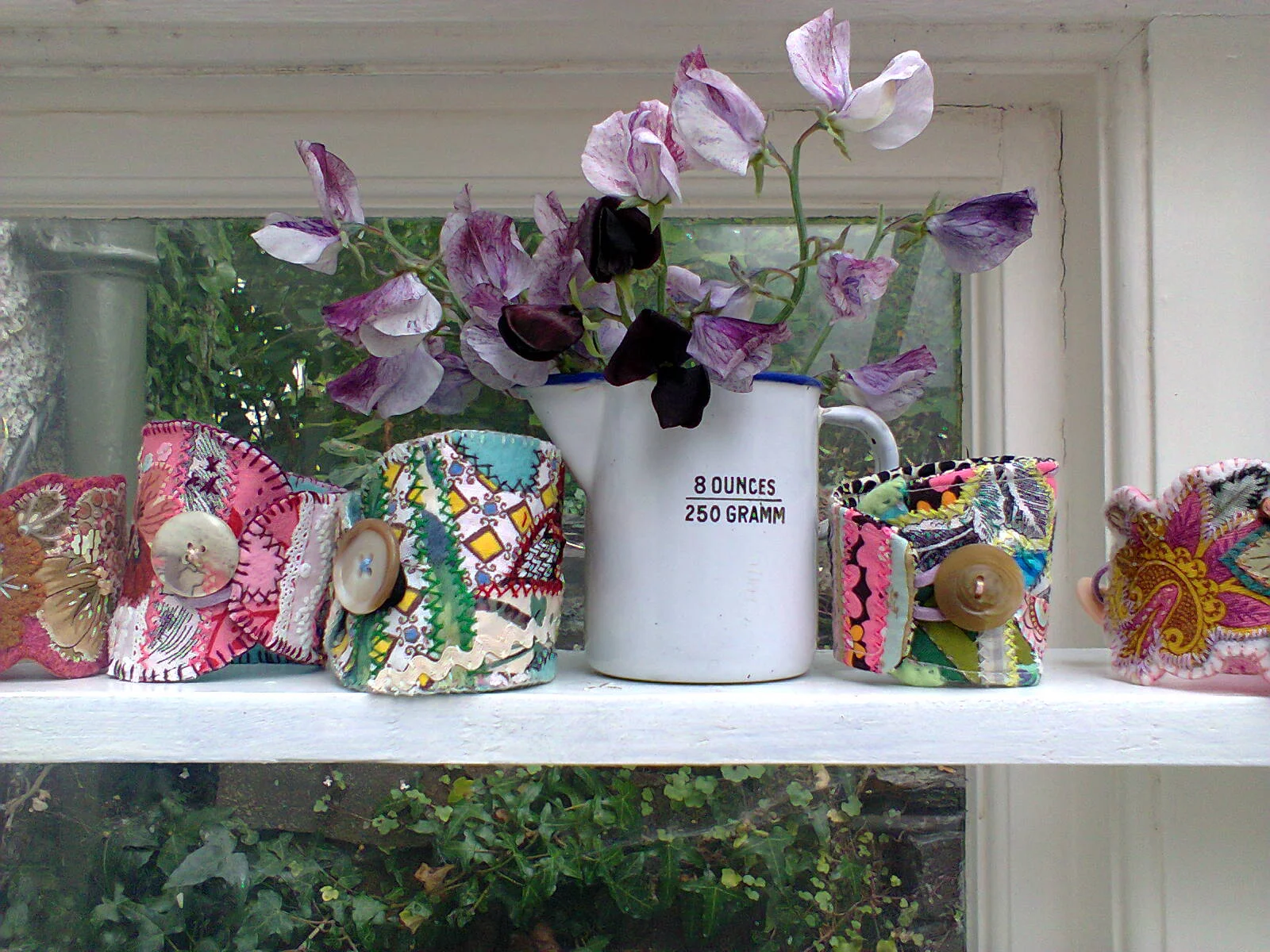 The textile cuffs I made looked lovely with these sweet peas.