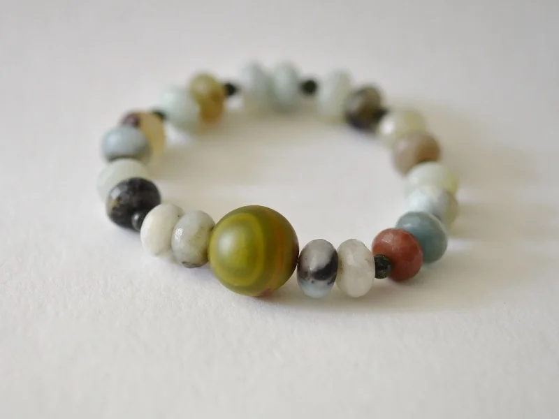 My own Amazonite bracelet with faceted beads and a mossy agate bead in the centre £38 in my etsy shop