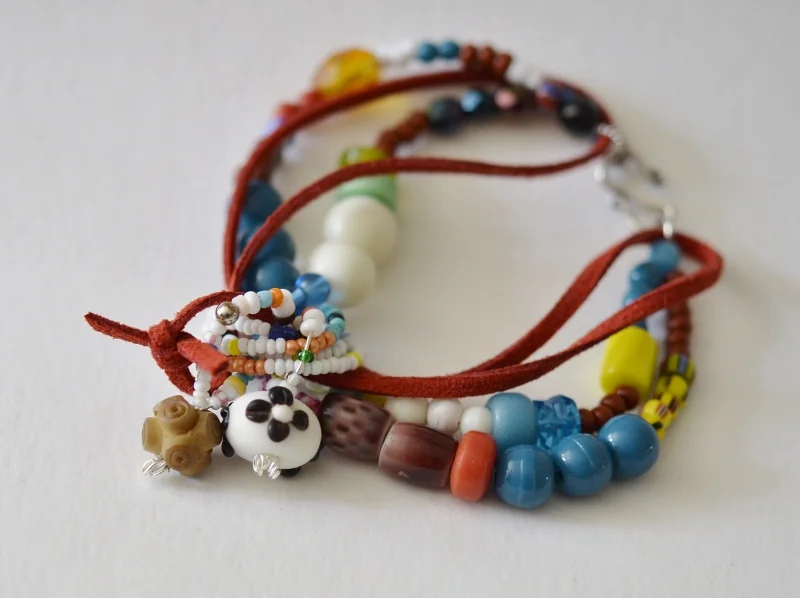 Multi strand bracelet of tiny trade beads and Padre beads