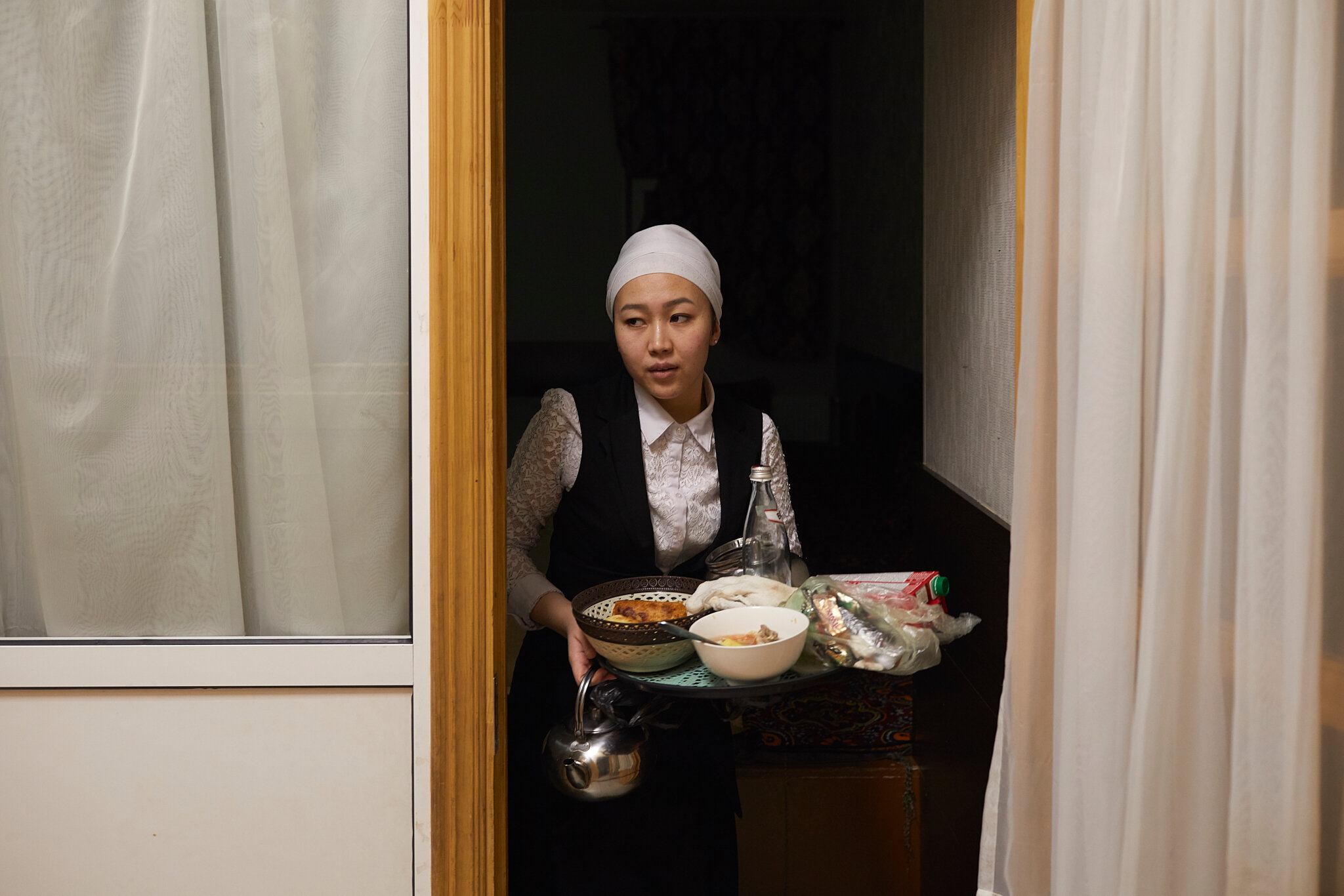  Russia, Moscow, chaikhana “Uzgen”, 04/10/2019. Tahmina K., 25, cleans up after guests at a chaikhana, or Central Asian teahouse, in Moscow. Tahmina sends money back home to Kyrgyzstan to support her mother, who cares for Tahmina’s four-year-old daug