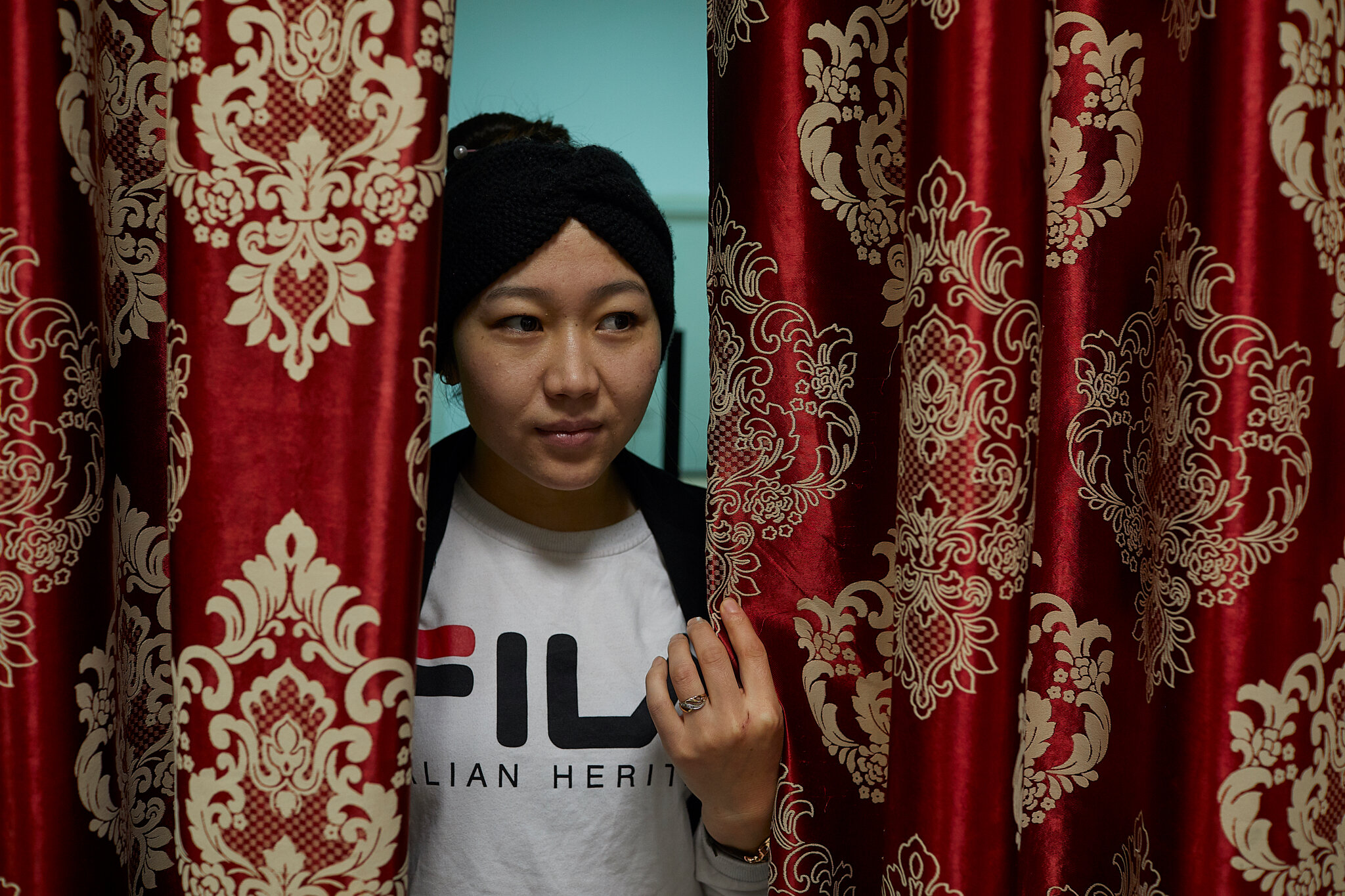 Russia, Moscow, chaikhana “Uzgen”, 11/10/2019. The portrait of Tahmina K. (25) in the chaikhana (teahouse) “Uzgen” she is working at. Tahmina sends money back home to Kyrgyzstan to support her mother, who cares for Tahmina’s four-year-old daughter.