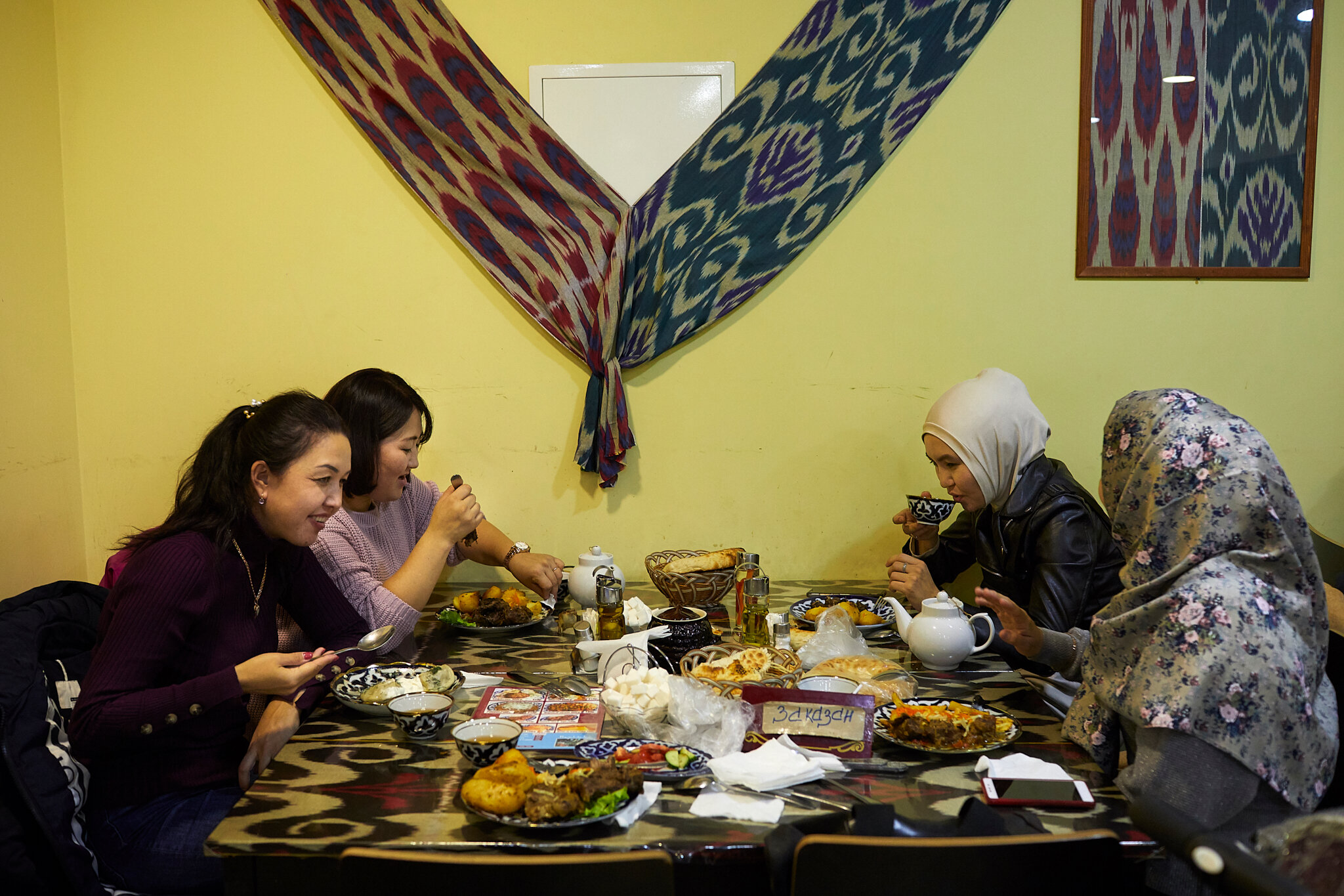  Russia, Moscow, 10/10/2019. Shahrizada Adanova is having dinner with her friends in Uzbek cafe in Paveletskaya Square 1. 