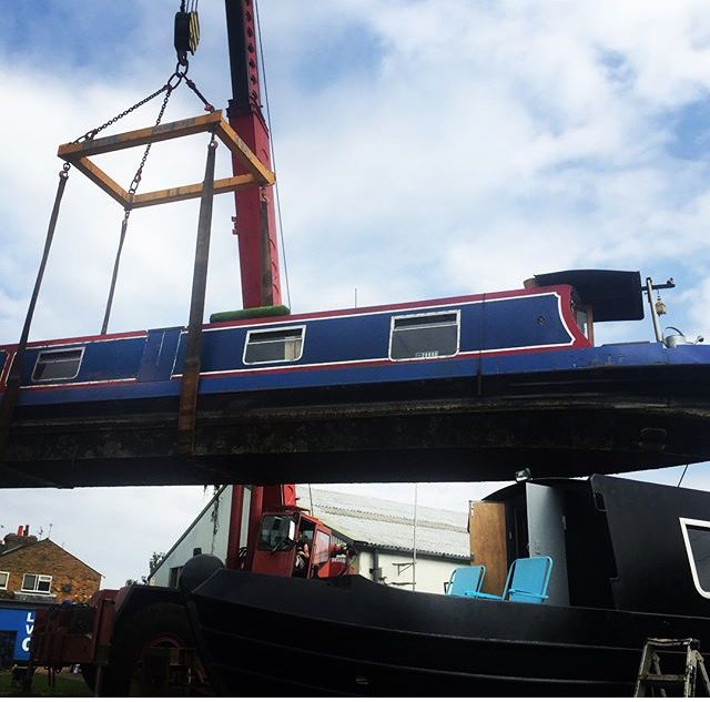 Out of the water for bottom blacking.