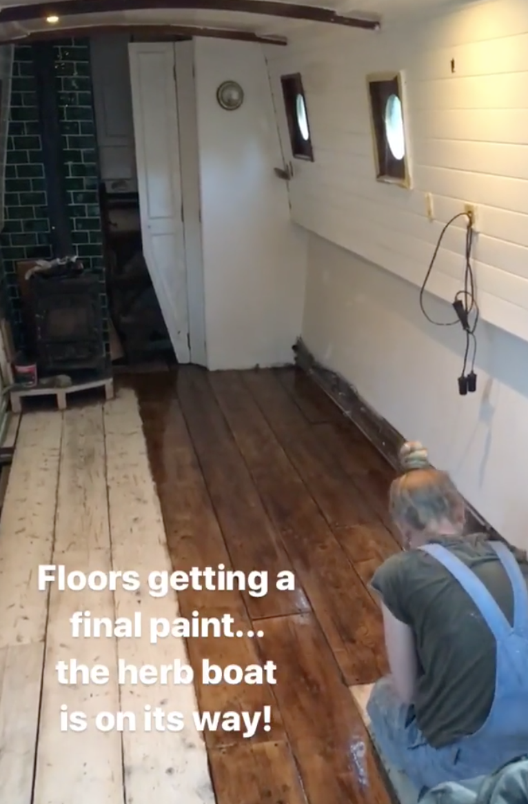 New scaffolding-board floor being painted June 2018