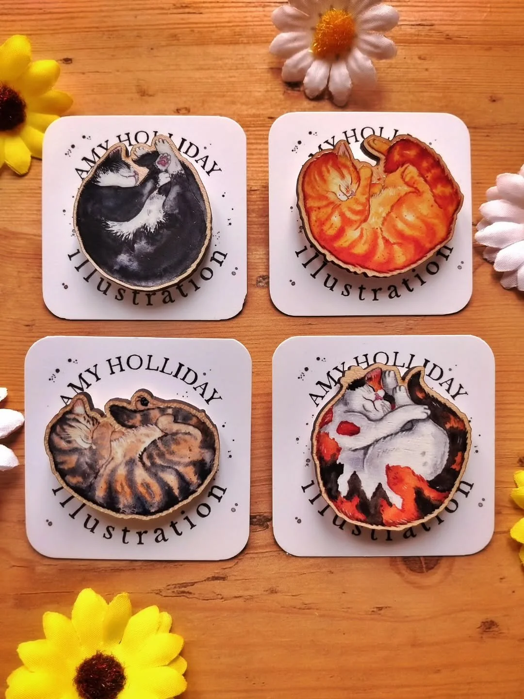 All the cosy, shrimpy wooden kitty pins, so far! Let me know which is your favourite, or tell me a new colour/breed you'd like to see :3 

Psst..I have a ginger &amp; white tabby design in the works, and a sphinx cat too...

I really wish you could s