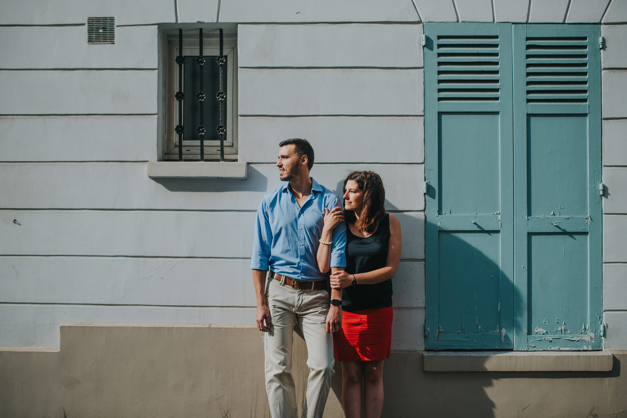 Couple in love holding hands on Montmartre street Paris