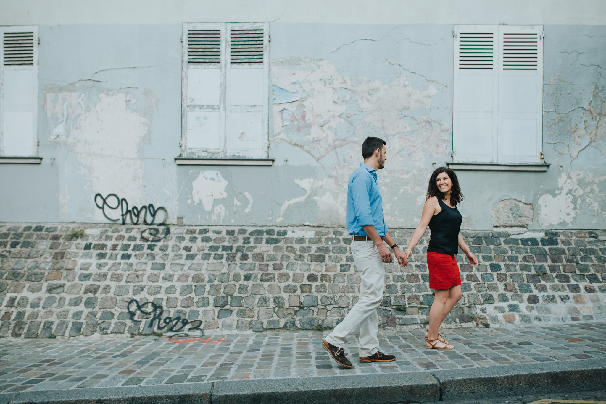 Paris pre-wedding shoot couple in love walking in Montmartre
