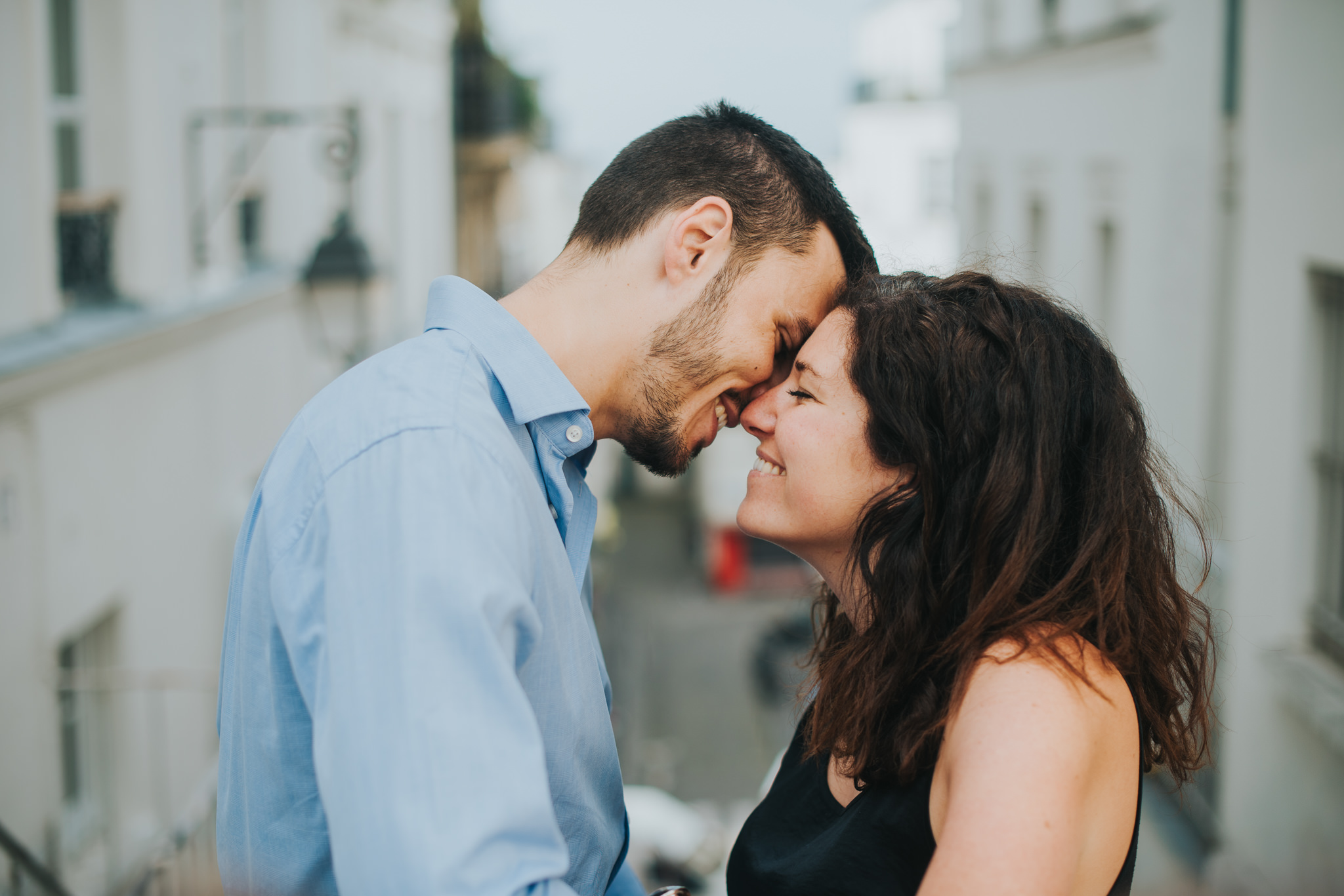 French couple shoot man and woman in love smiling and kissing