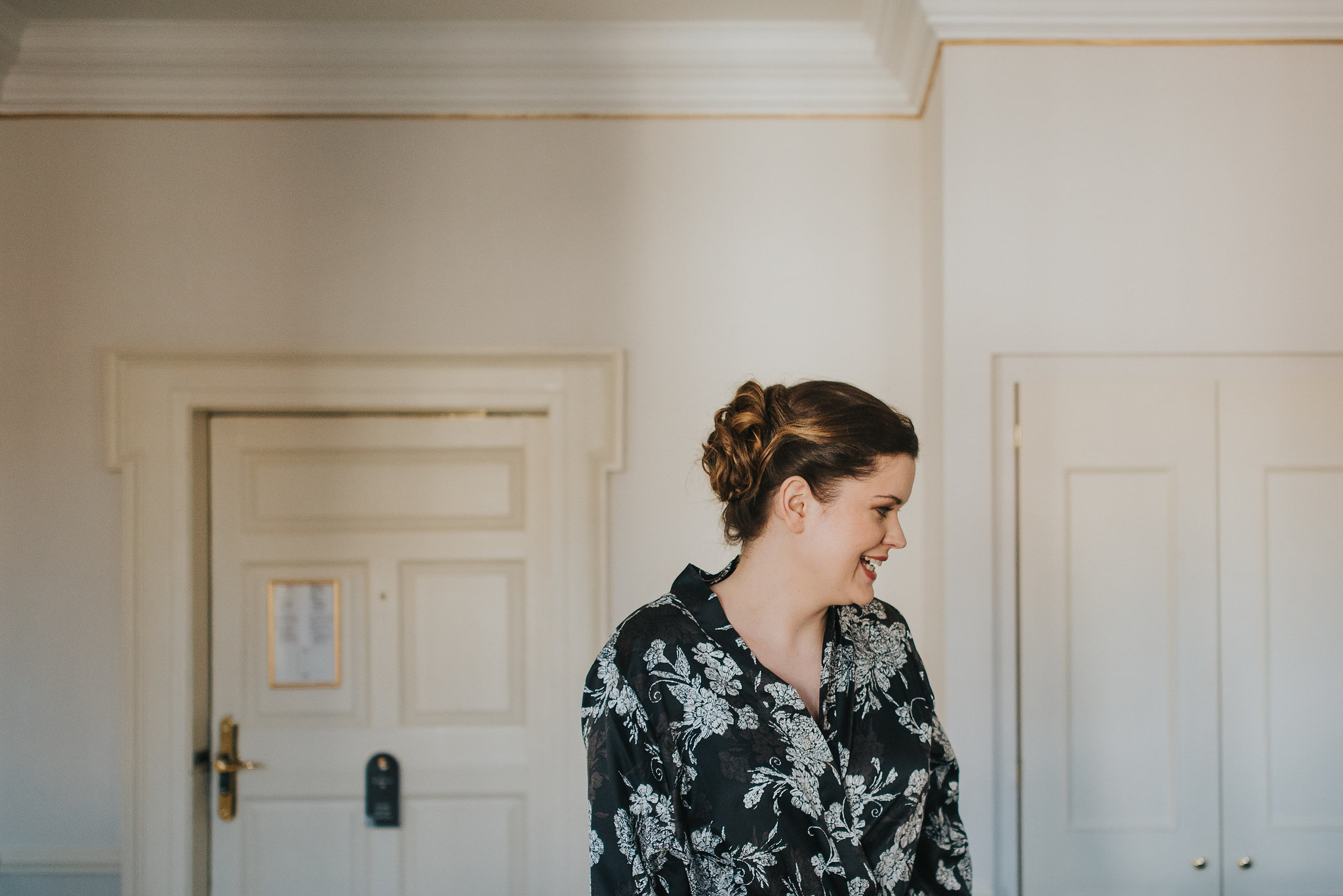 bride getting ready on her wedding day at Merrion Hotel Dublin