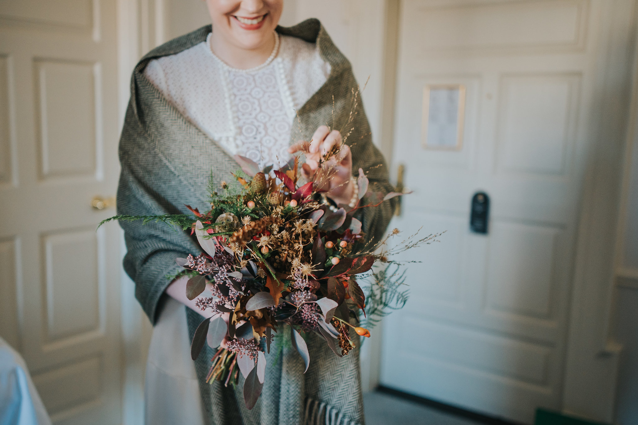 Close up of bride's bouquet in hotel room