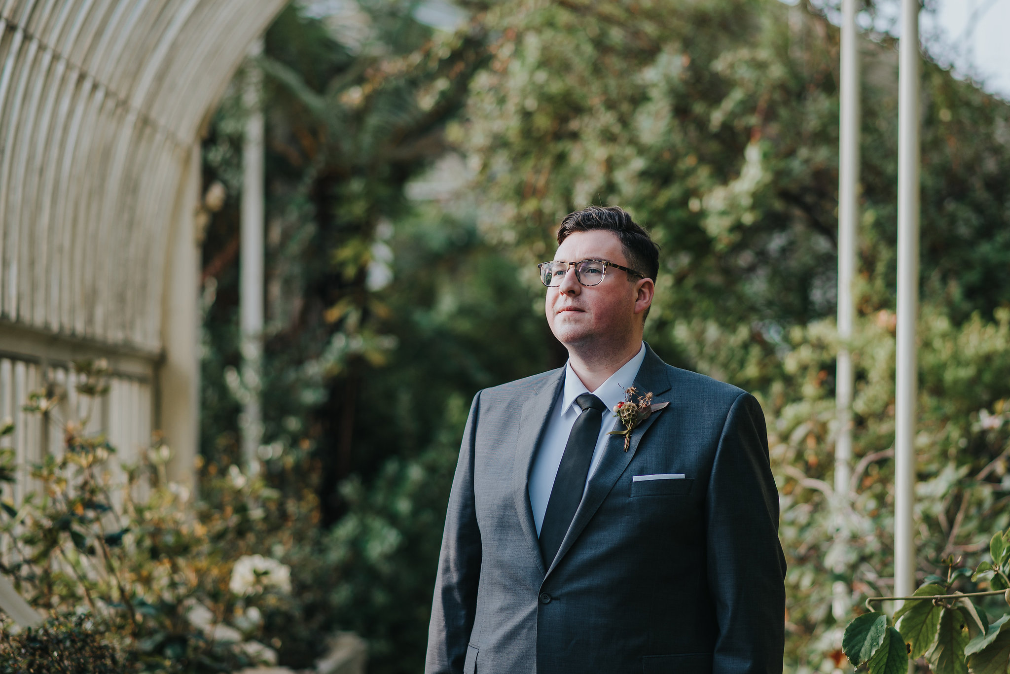 Groom at the Botanic Gardens Dublin on his wedding day