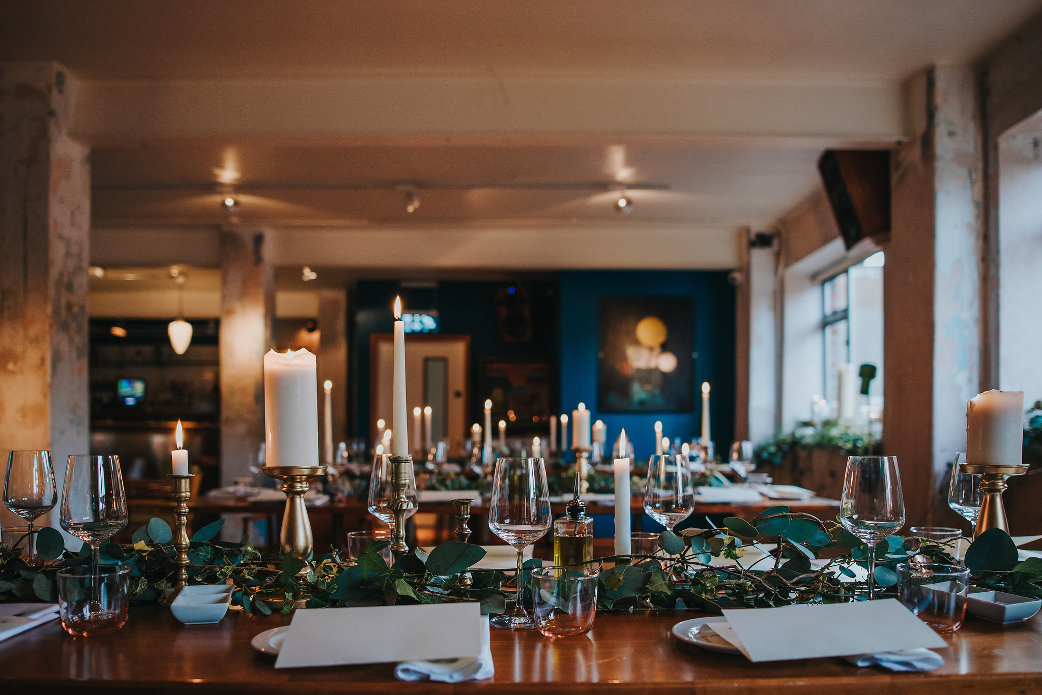 Wedding table details of wine glasses and candles in the Drury Buildings Dublin