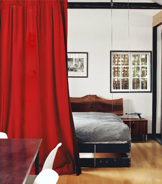Red curtain room divider