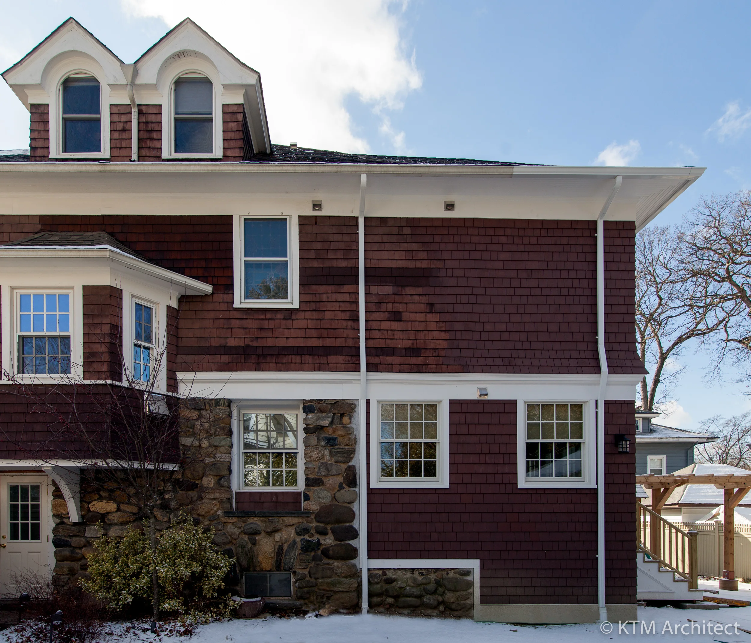 This exterior view shows the extension off the back of the house.