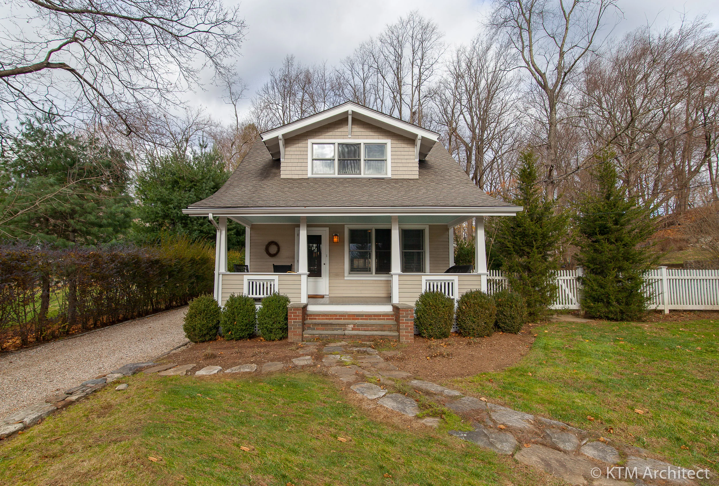 The exterior of the home reflects the simplicity of the Craftsman style.