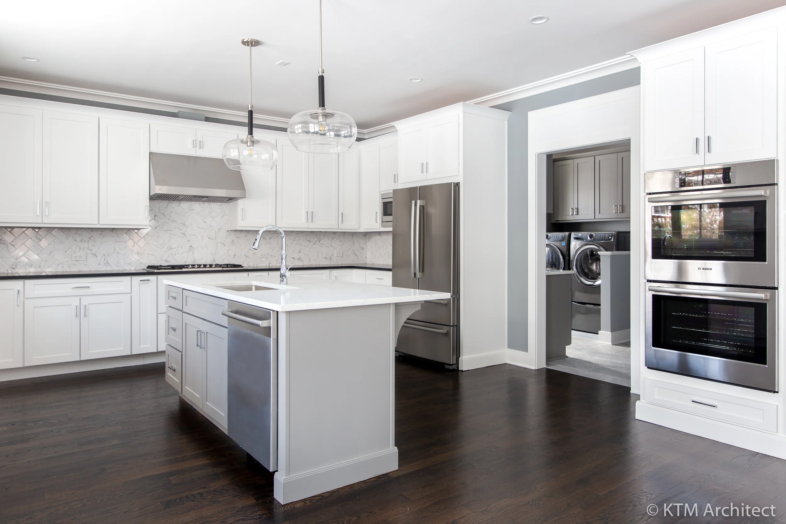 The generous kitchen allows for multiple prep areas and efficient workflow.
