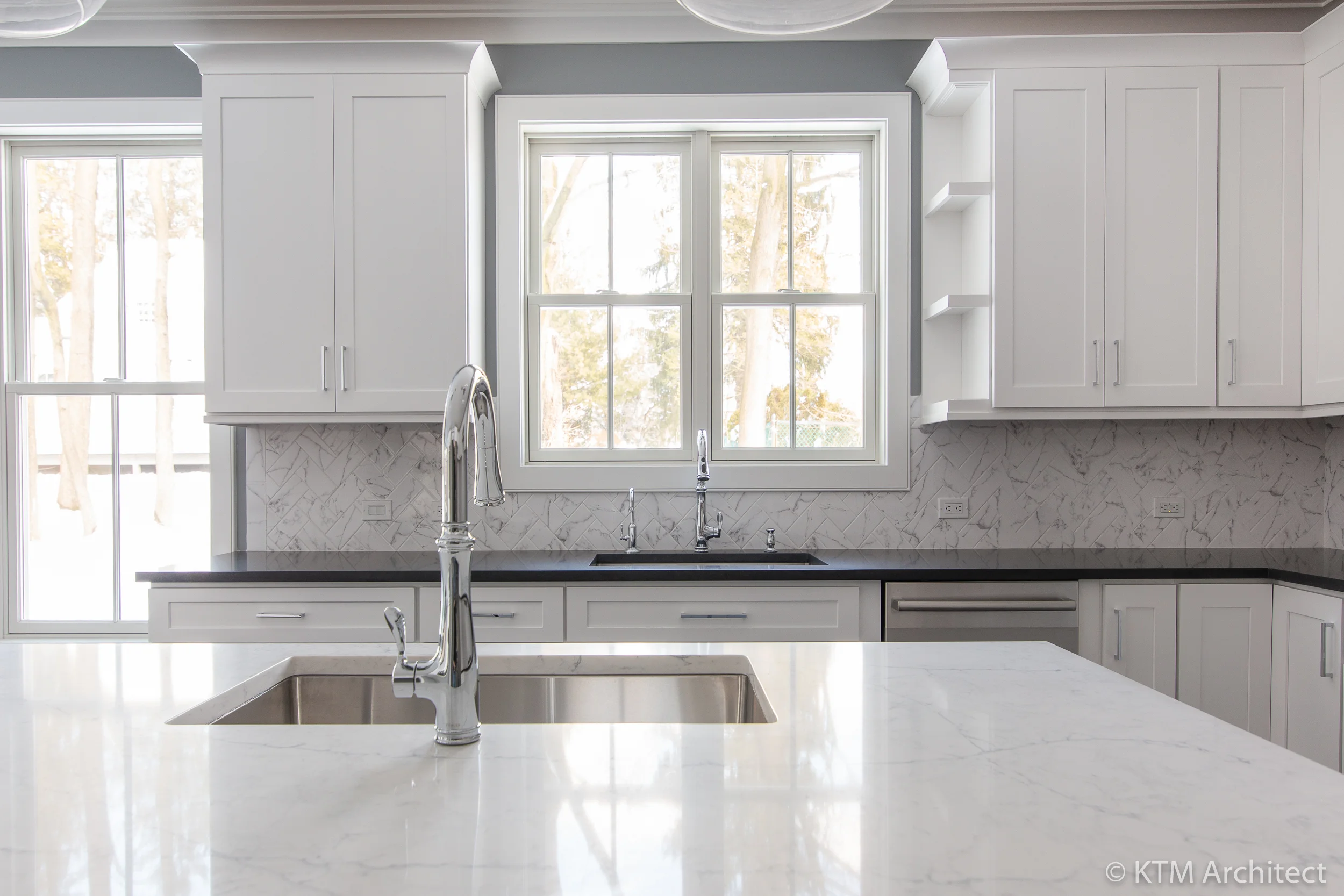 A closer view of the offset counter sinks allow. The windows provide plenty of natural light.