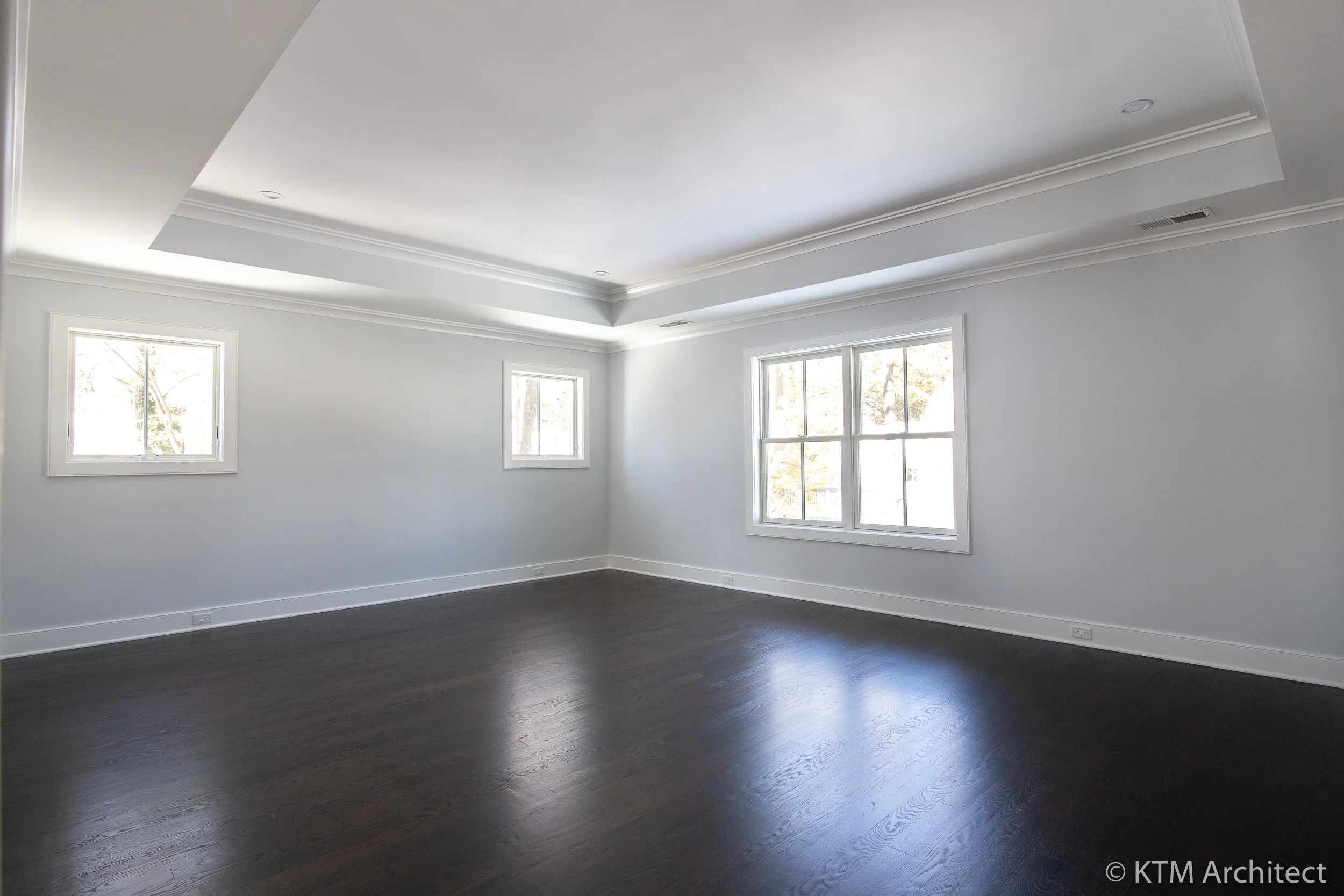 Moving to the bedrooms, the master has a trace ceiling to help add drama to the space.