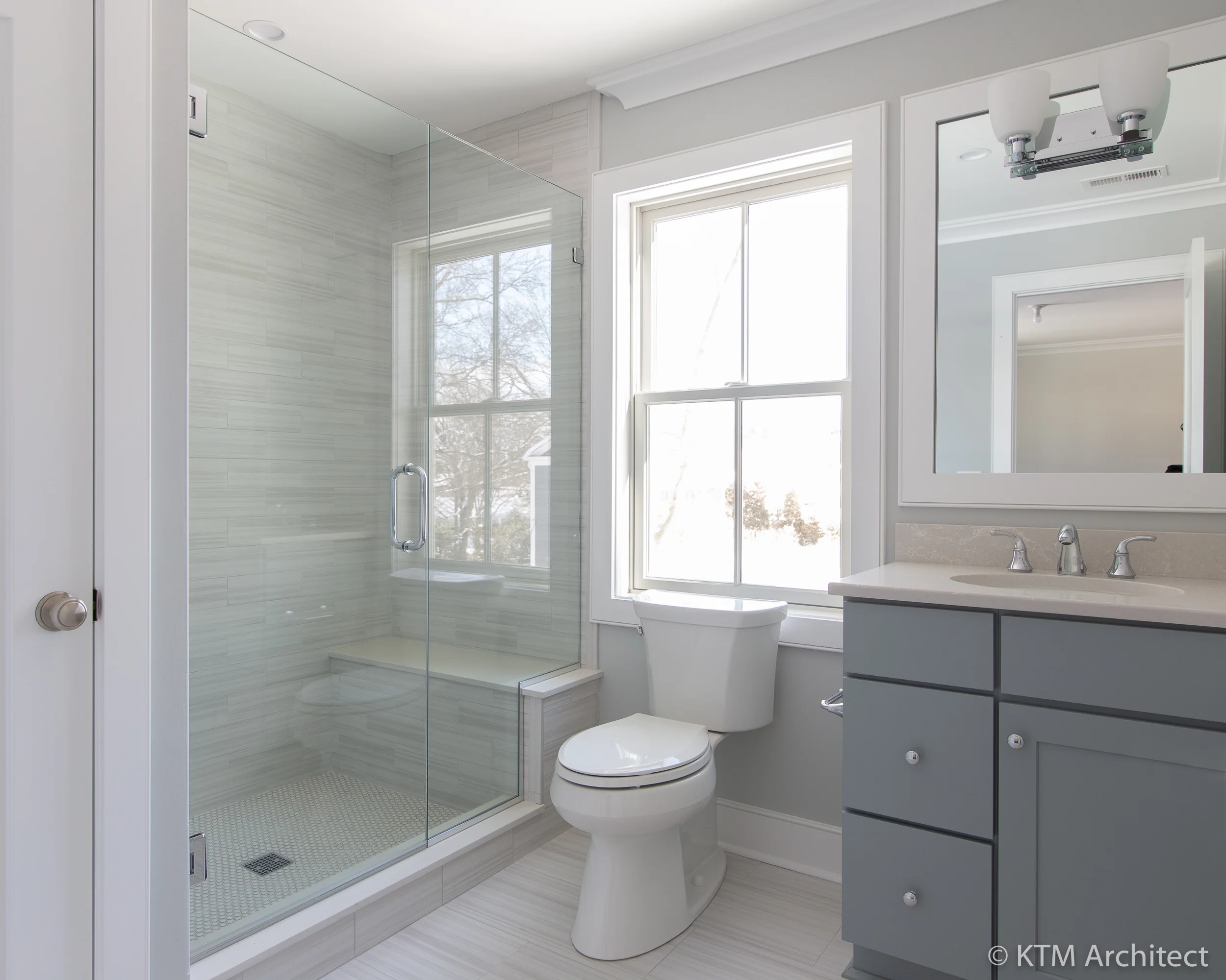 Well-appointed bathrooms adjoin the other bedrooms as well. For older children there is a walk-in shower with bench.