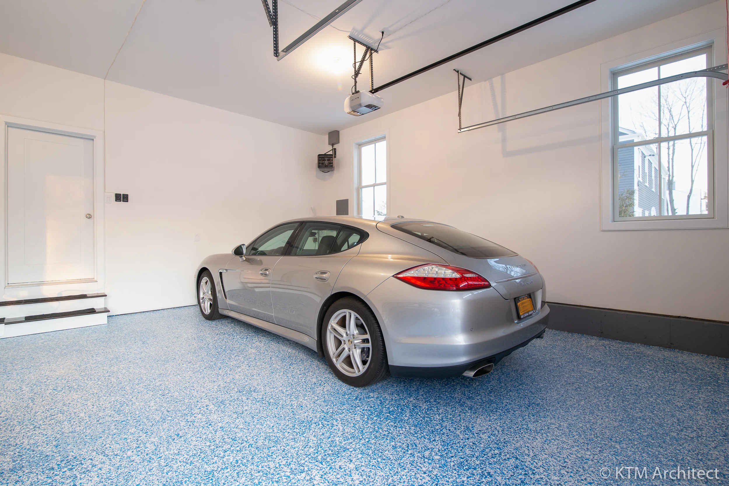 A double garage accommodates two cars with additional room for storage as well.