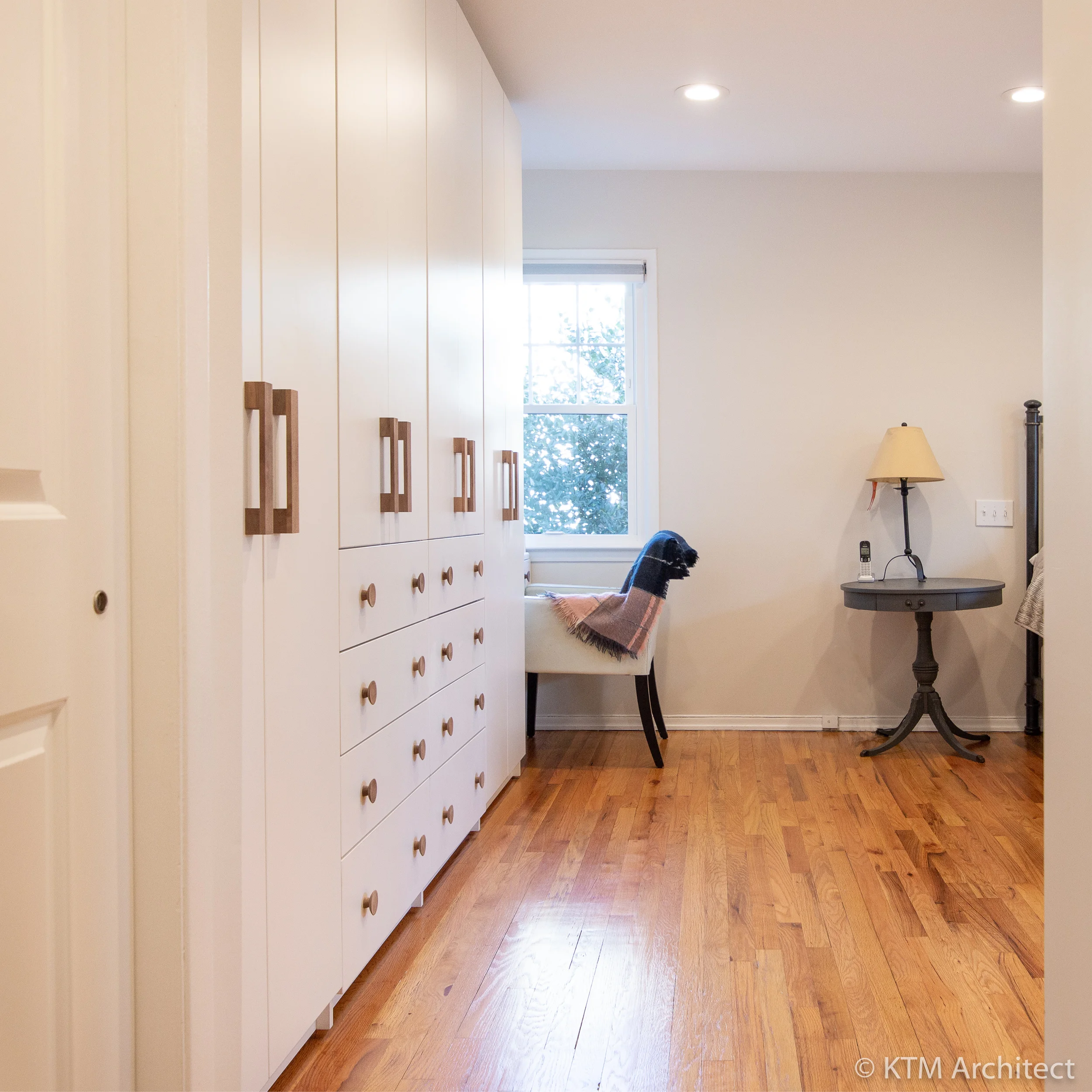 Entering the master suite, we see the wall of built-in closets on the left side.