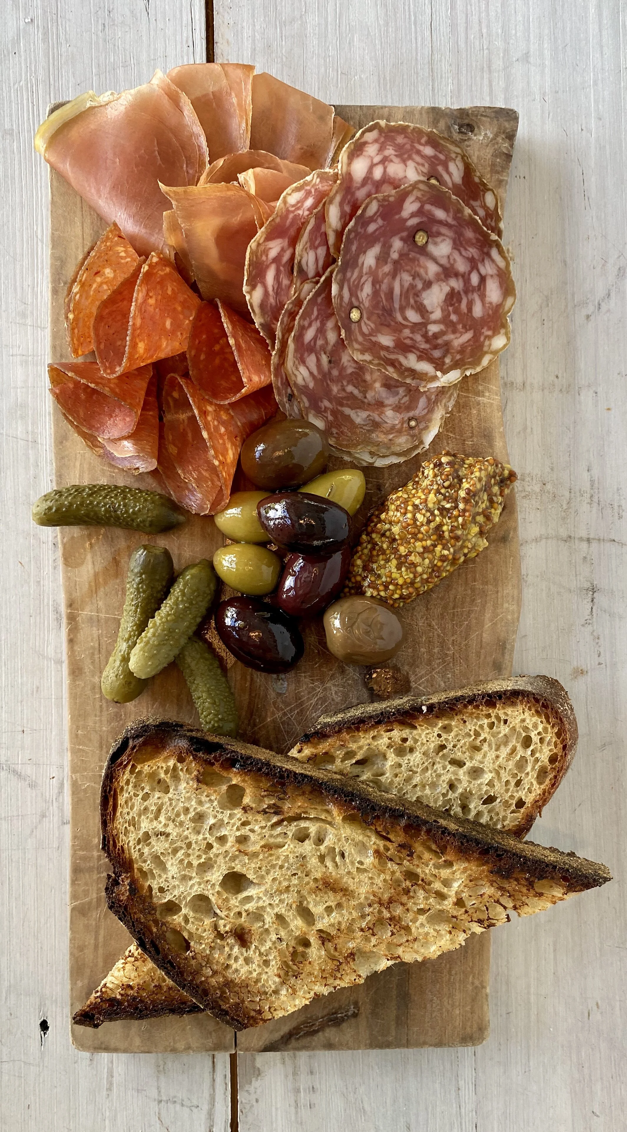 BOARDS + BOWLS House Cured Charcuterie, marinated olives, mustard