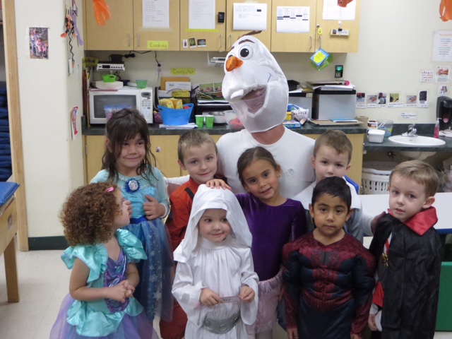 TLC kiddos have fun with Executive Director Matt Eldred on Halloween last year. Kids are welcome to bring their costumes on Monday, October 31st, for a TLC Costume Parade.